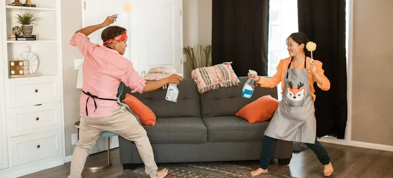 A couple cleaning your apartment