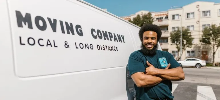 A mover in front of the van 