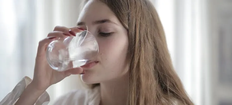 A woman drinking water 