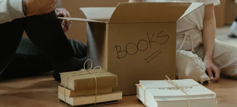 A couple moving your home library to Baltimore