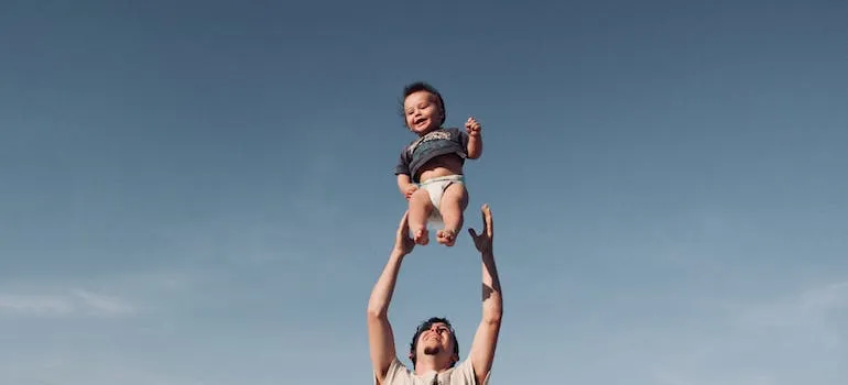 A man and a baby