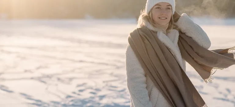 A woman wearing winter clothes