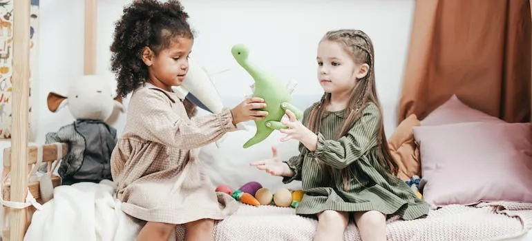 Two kids playing with toys