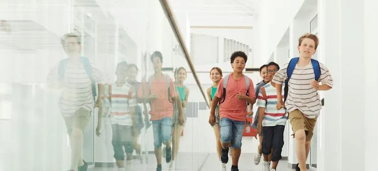 Children running in a hallway