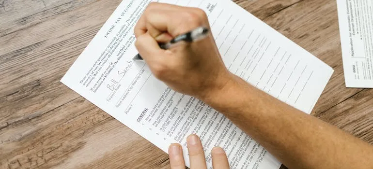 A person filling a questionnaire