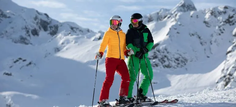 A couple on the ski slope