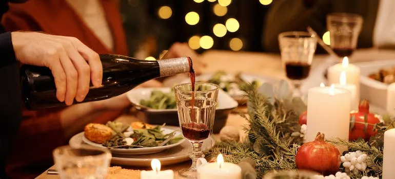 A person pouring wine