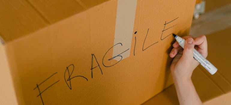 A moving box labeled fragile 