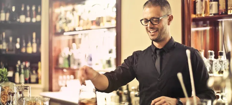 A bartender preparing a cocktail