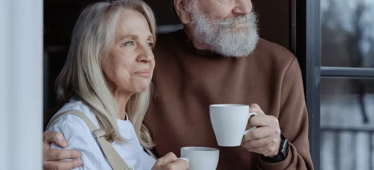 A senior couple at their new home
