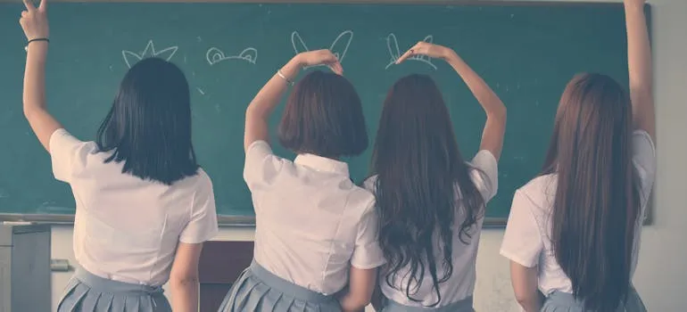 Four girls in the classroom