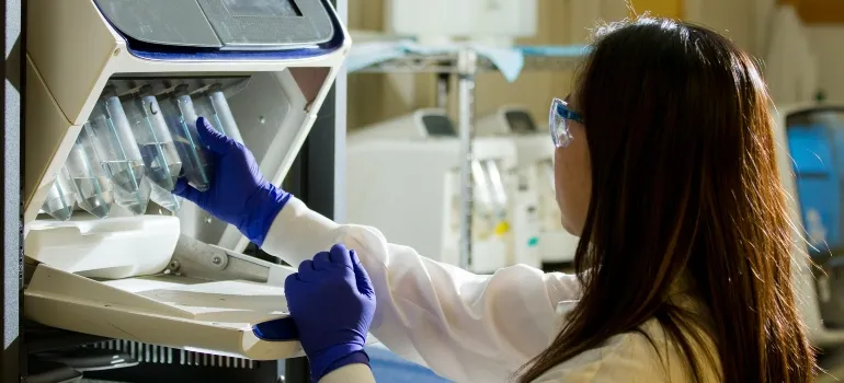 Picture of a person working in a lab