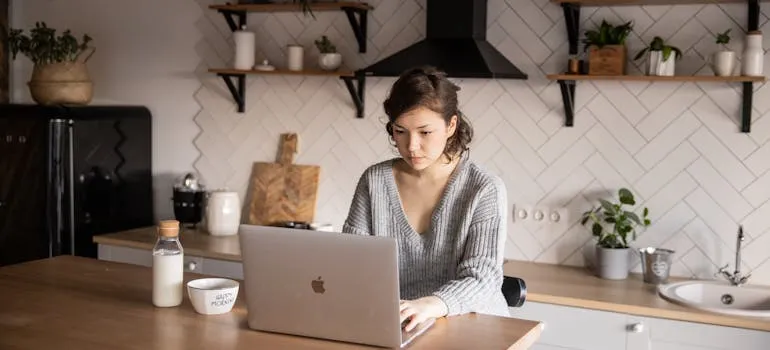 A woman using a laptop