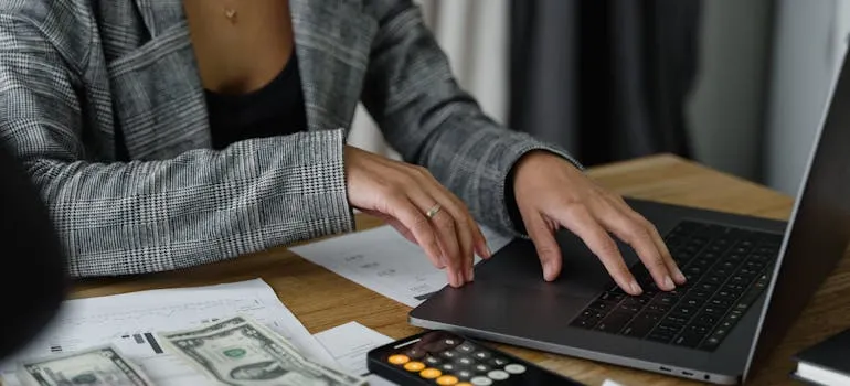 A wpman calculating money 