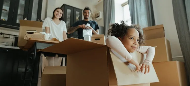 A family getting ready to relocate to one of the places to raise kids after leaving Virginia