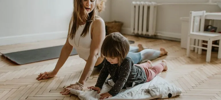 Mother and daughter exercising