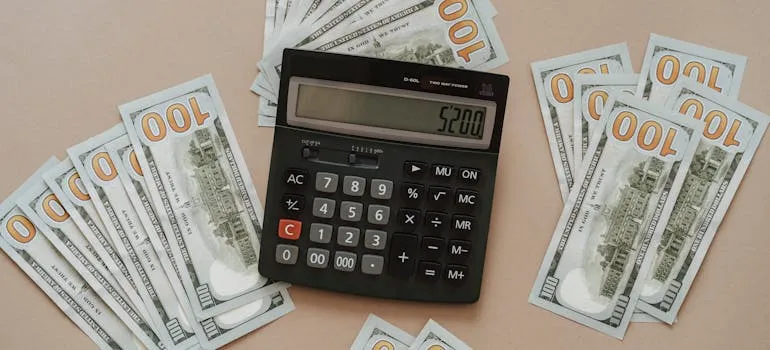 Dollar bills and a calculator