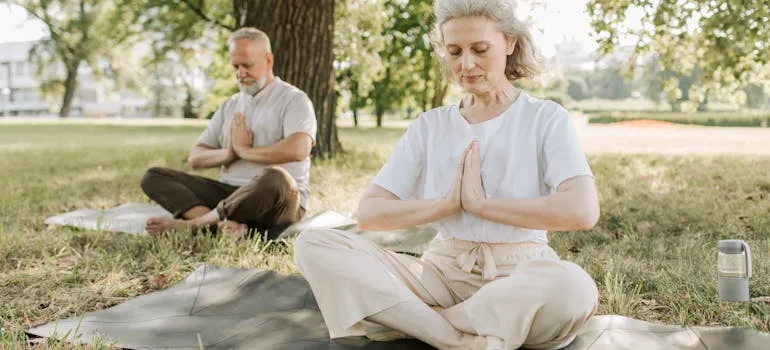 A senior couple doing yoga