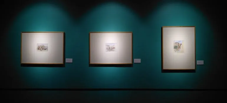 Three paintings in the gallery 