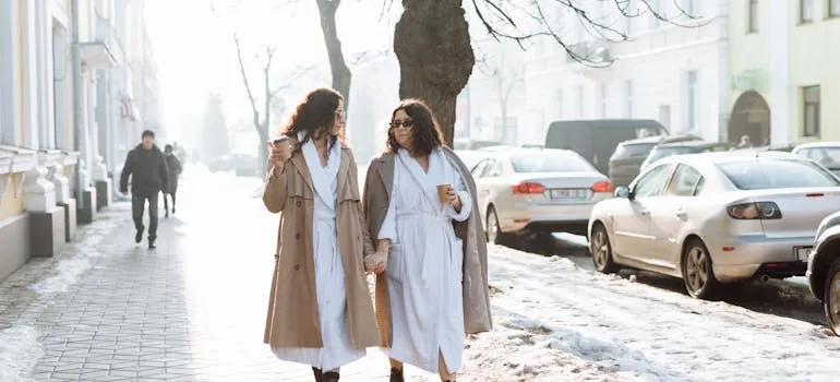 Two women on the street talking about neighborhood guide to Arlington