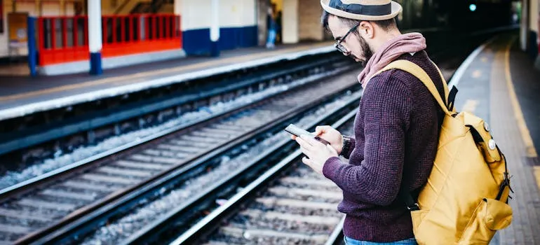 A man waiting for a train