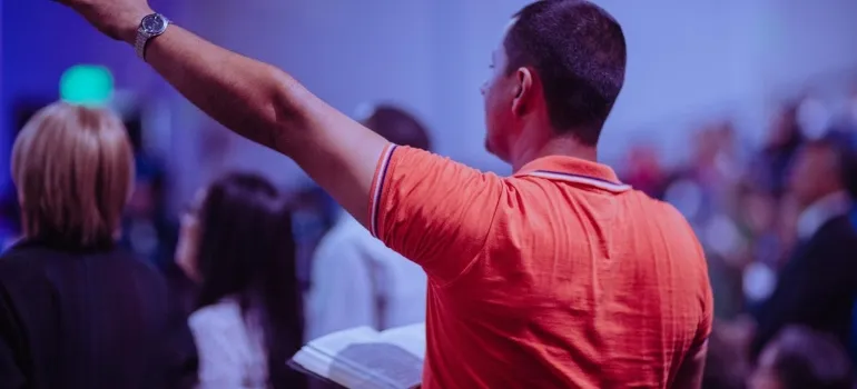 a man in church, a place where you can make some new friends
