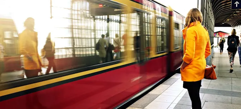 A woman waiting for a train