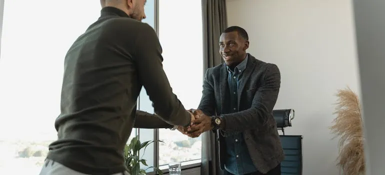 Two people shaking hands 