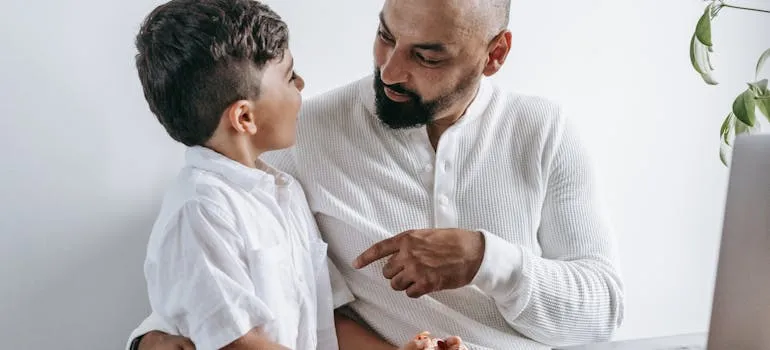 A man talking with the kid
