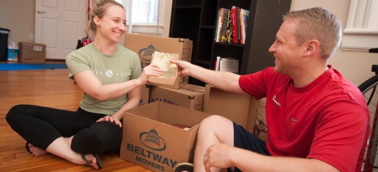 two people packing using the sturdy Beltway boxes