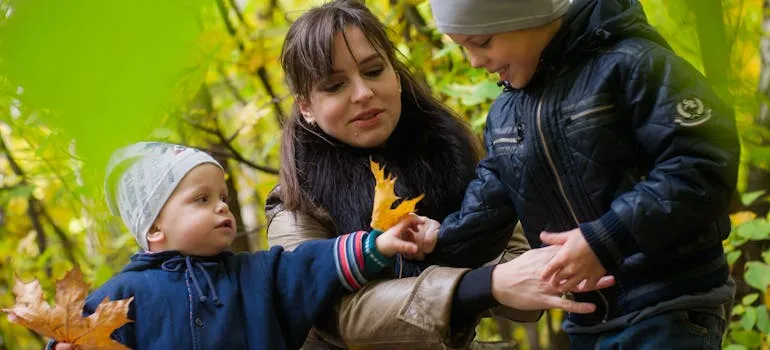 Mother with the kids in the park