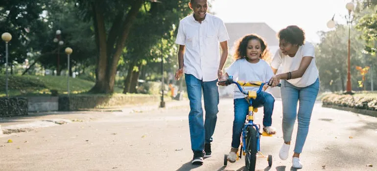 A family in the park in one of the suburbs in Austin for former DC residents