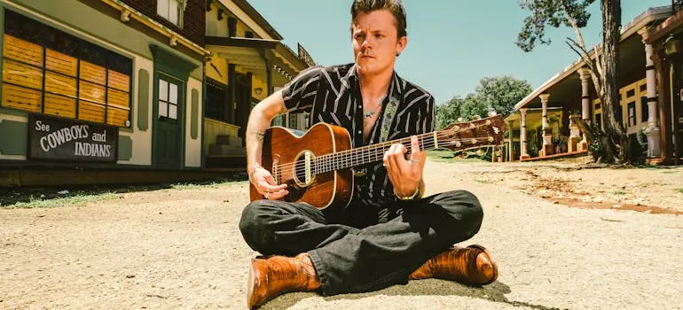 A person playing a guitar