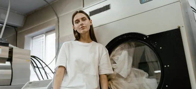 A woman in the utility room