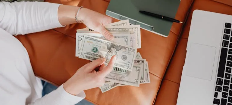 A person counting money 