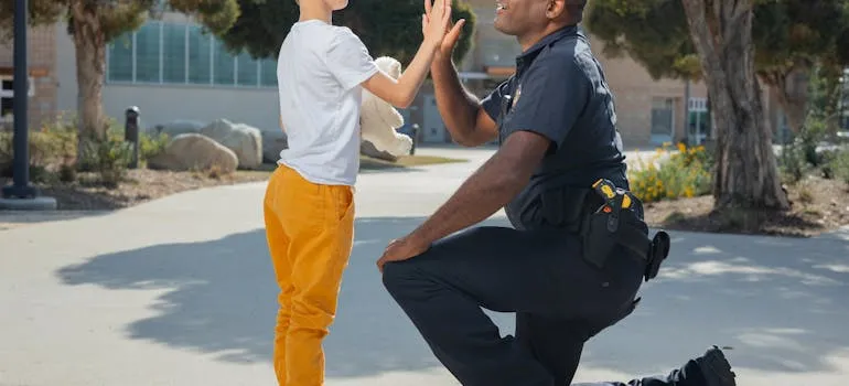 Policeman and a boy on the street