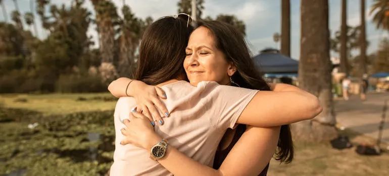 Two women hugging