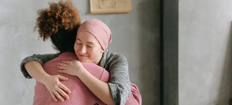 Two women hugging
