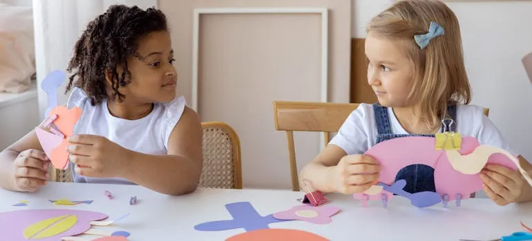 Kids doing artwork from the paper