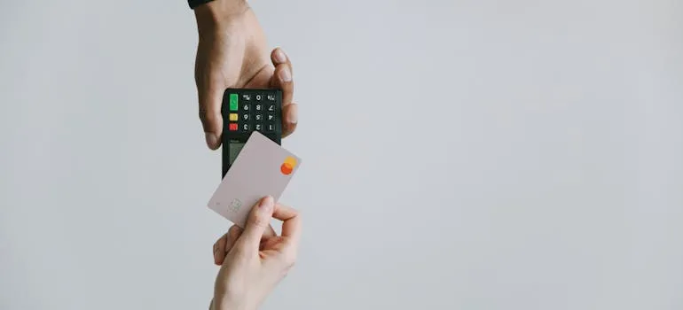 A person paying with the card