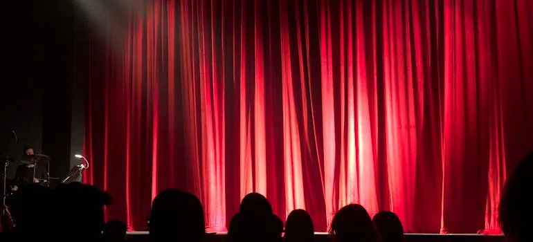 People in the theater enjoying one of the things to do in Baltimore