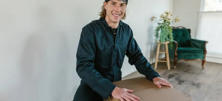 A mover next to the moving box