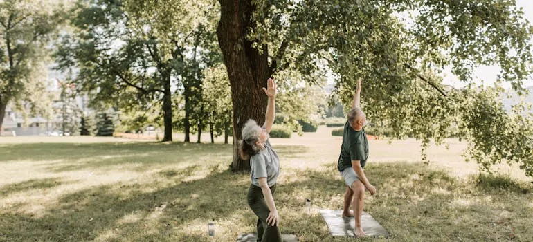 Two people doing yoga