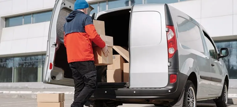 A mover loading a van
