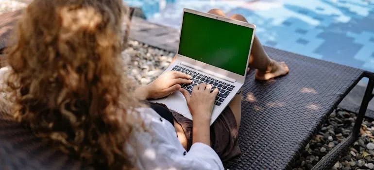 A woman using a laptop
