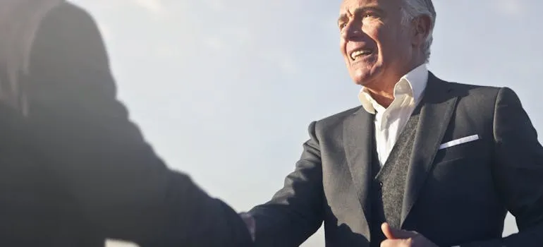 Two people shaking hands