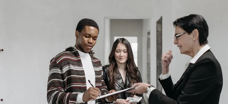 A couple looking at the green moving guide
