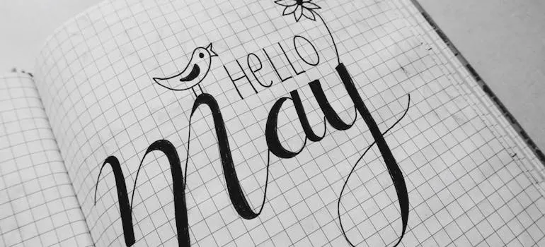 Hello May writen on the paper