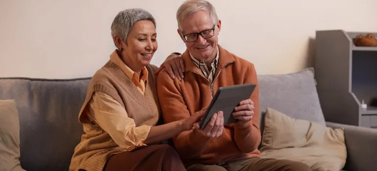 A senior couple in their new home after retiring from DC to Florida