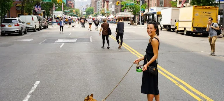 A woman walking with the dog